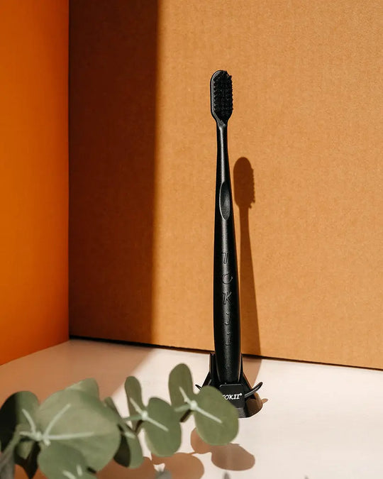 Eco-friendly Tokii black toothbrush for sustainable oral care