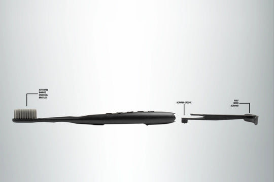 Tokii black toothbrush with attached tongue scraper