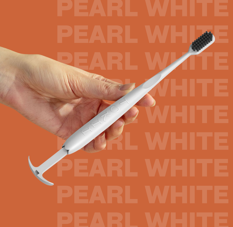 White Tokii Toothbrush with attached Tongue Scrapper